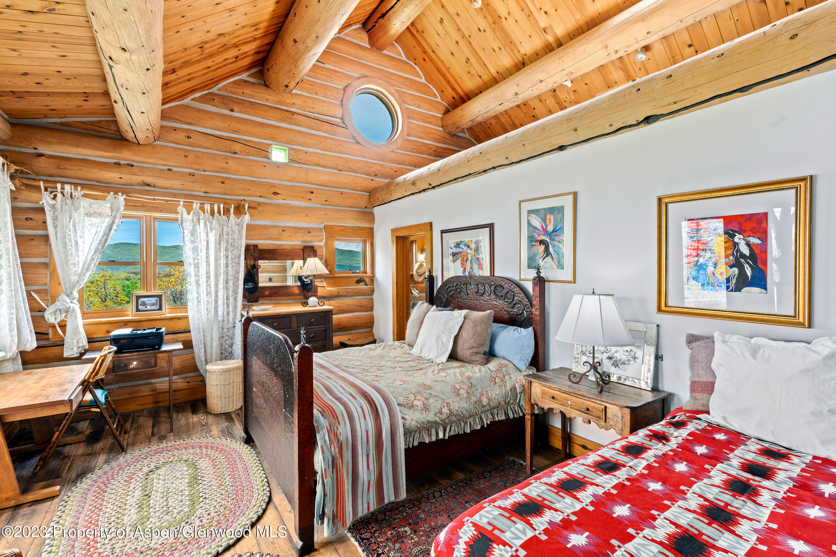 2088 Old Herron Road Basalt, CO 81621 - Photo 21 of 38 a bedroom with two beds and a large window