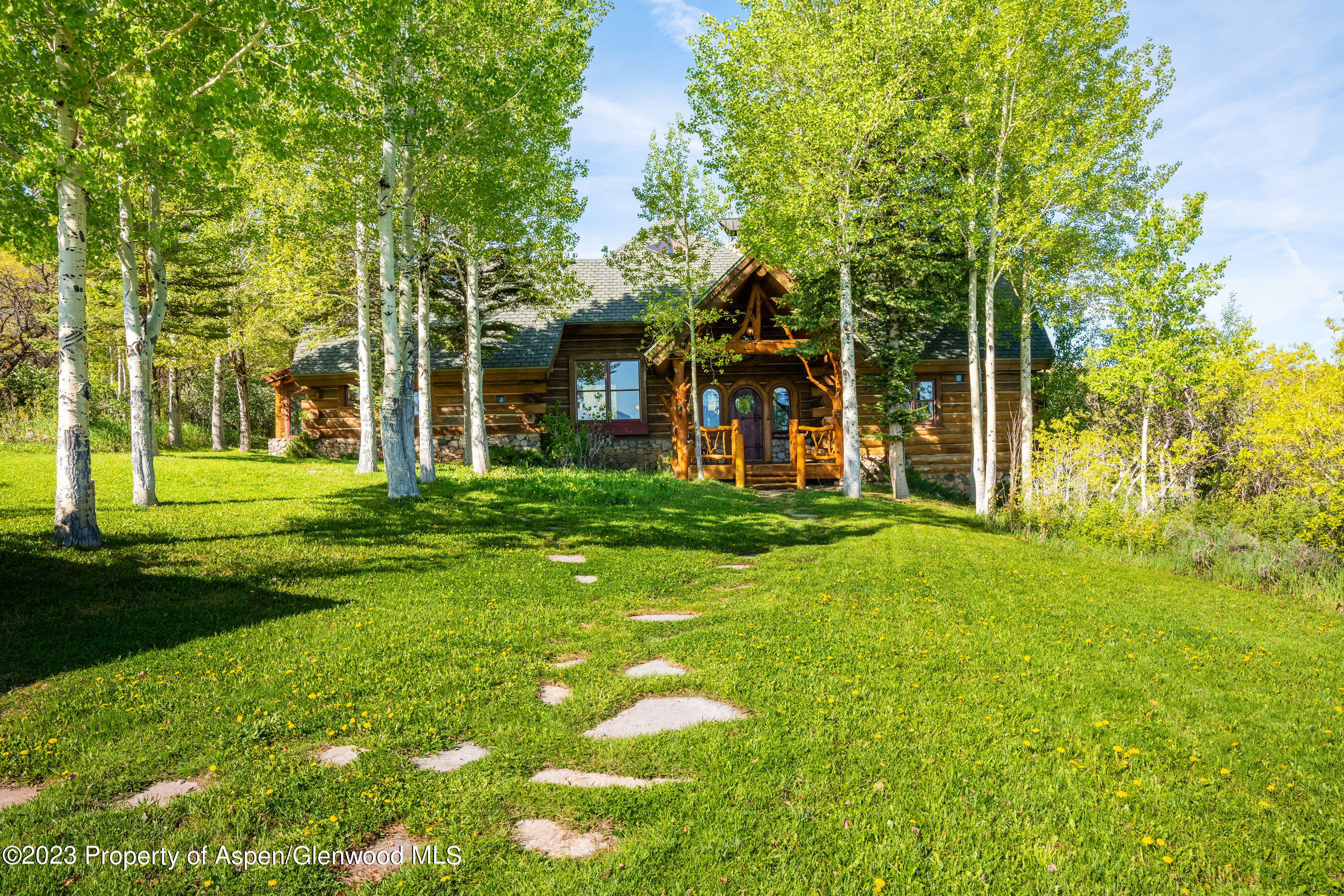 2088 Old Herron Road Basalt, CO 81621 - Photo 24 of 38 a view of a house with a big yard and large trees