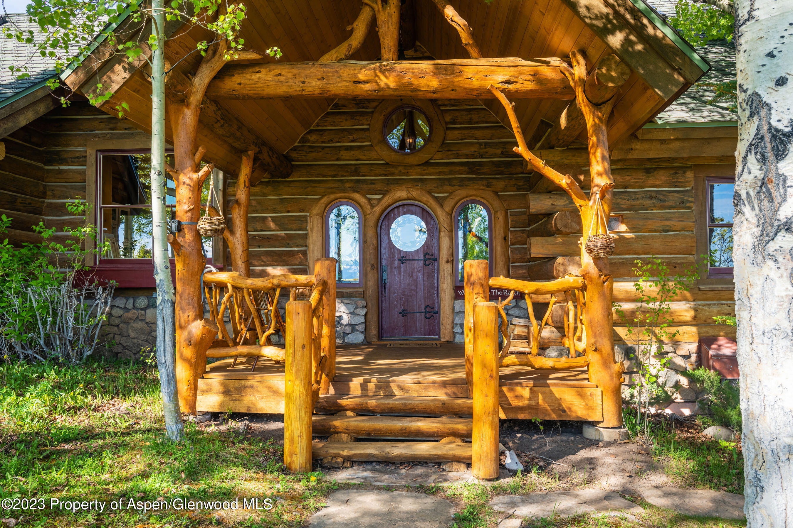 2088 Old Herron Road Basalt, CO 81621 - Photo 25 of 38 a front view of a house with large trees