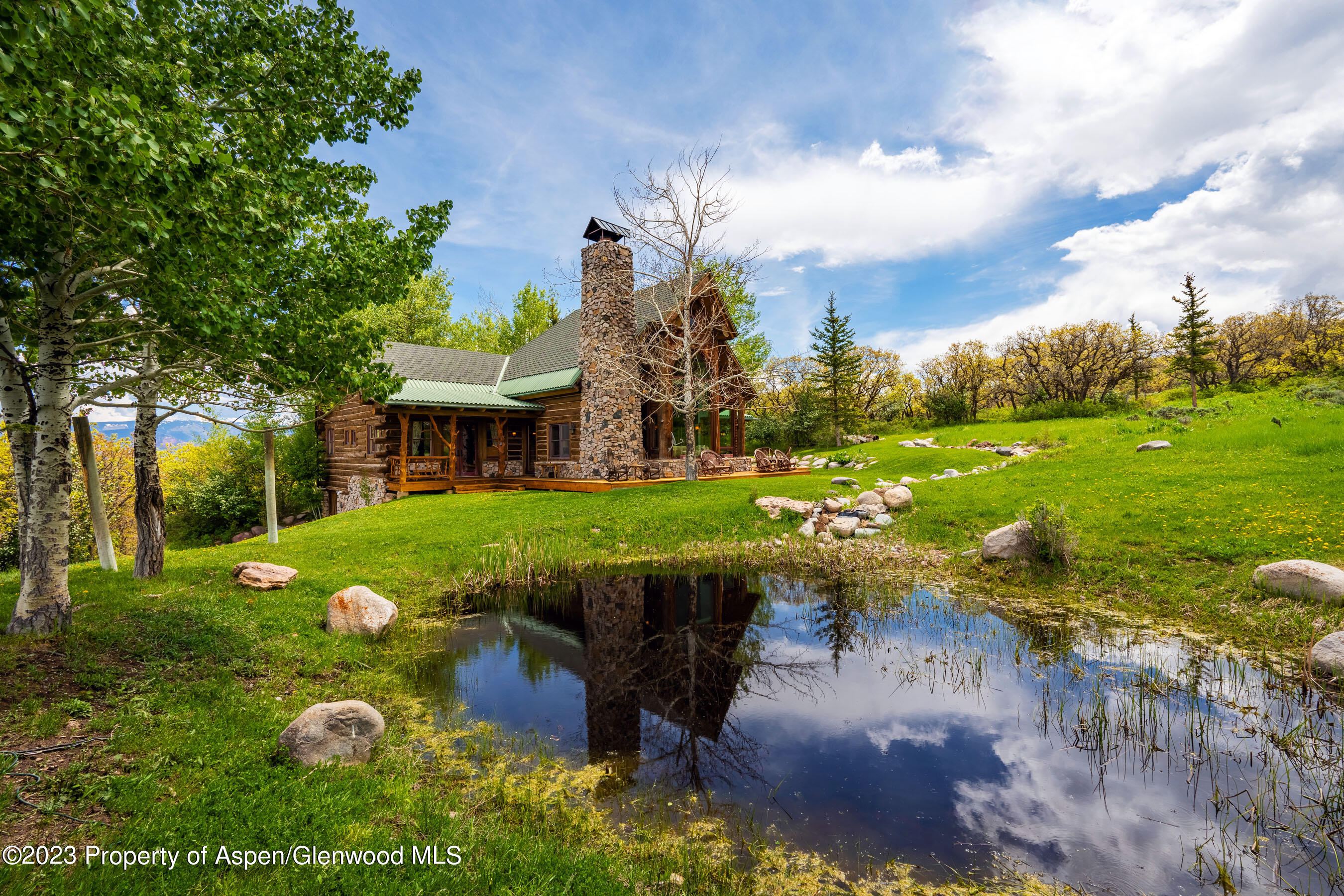 2088 Old Herron Road Basalt, CO 81621 - Photo 31 of 38 a view of a garden with a building in the background