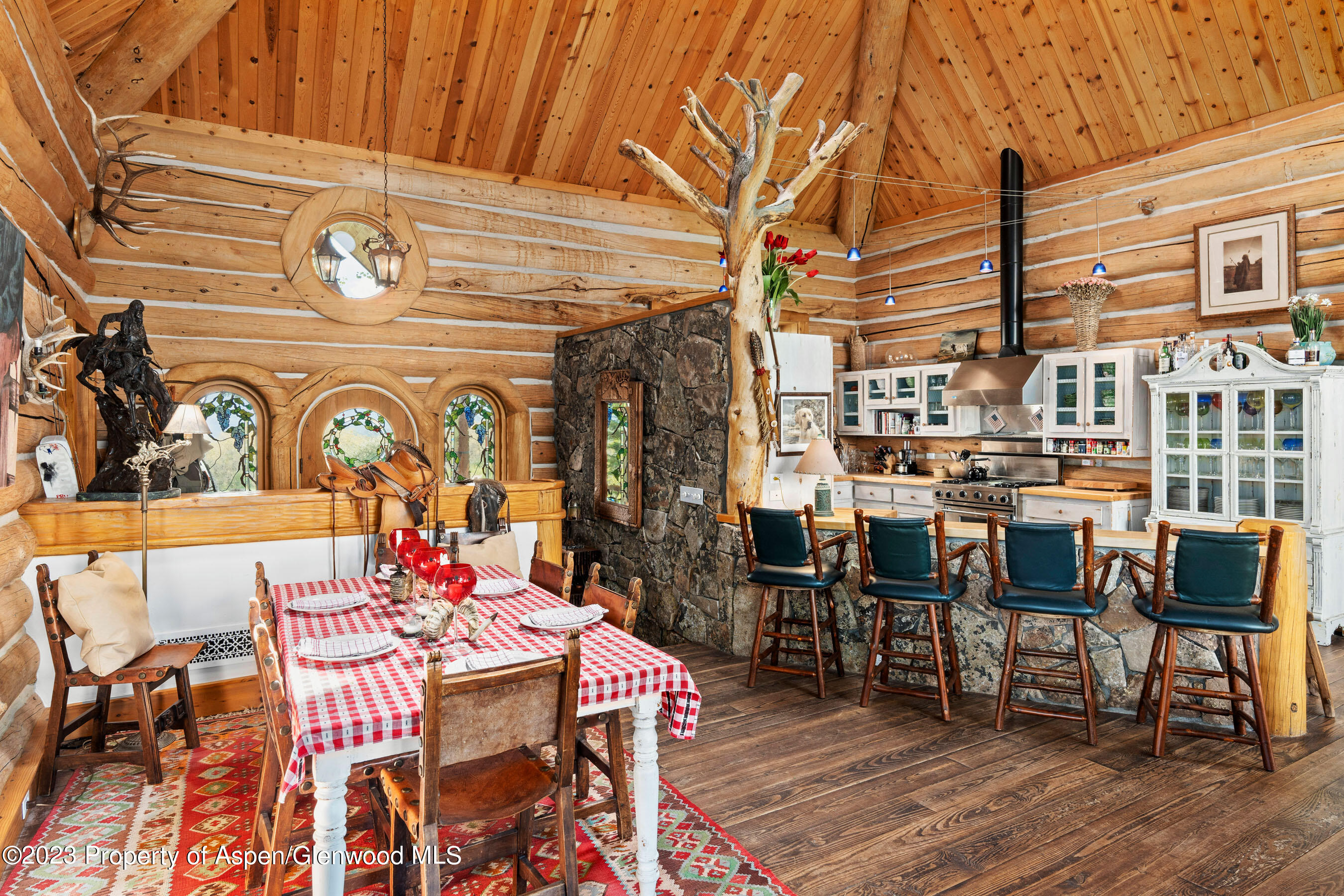 2088 Old Herron Road Basalt, CO 81621 - Photo 9 of 38 a view of a dinning tables and chairs in the patio