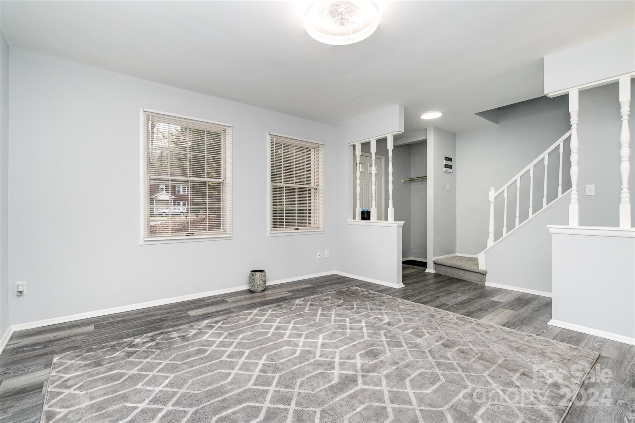 1101 Scaleybark Road, Unit B Charlotte, NC 28209 - Photo 3 of 18 a view of an empty room with a window