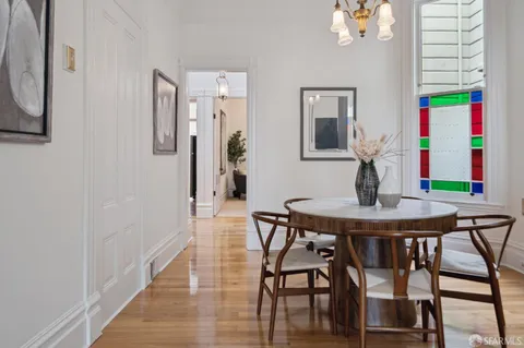 a view of a vase of flowers sitting on a table