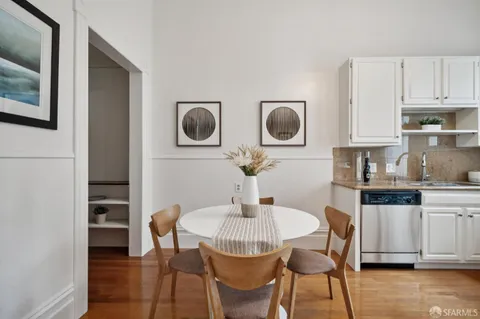 a bedroom with bed and a couch