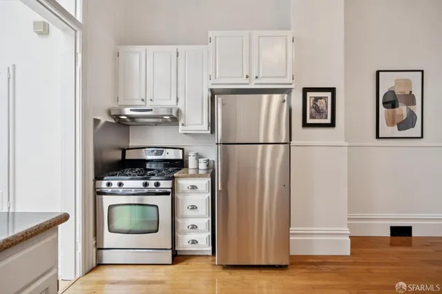 a workspace with furniture and a window
