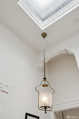 a bathroom with a sink mirror and toilet