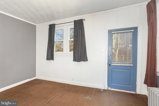 a view of a room with front door