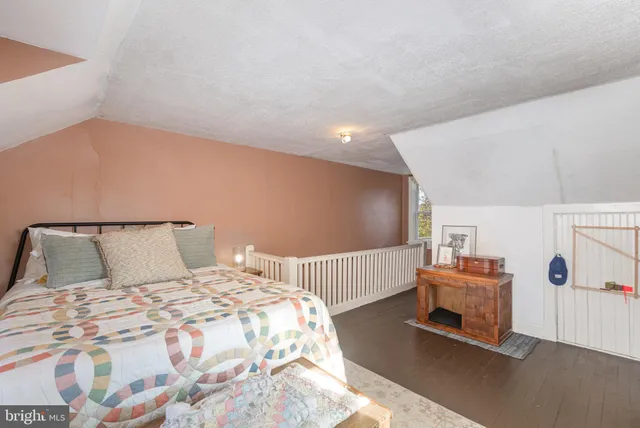 a view of an empty room with stairs