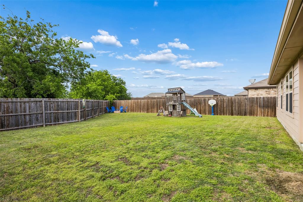 802 Rustic Way Royse City, TX 75189 - Photo 17 of 38 a view of a backyard