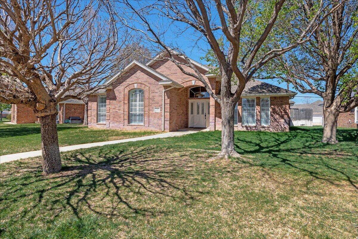 5823 Nicholas Circle Amarillo, TX 79109 - Photo 1 of 31 a house view with a garden space
