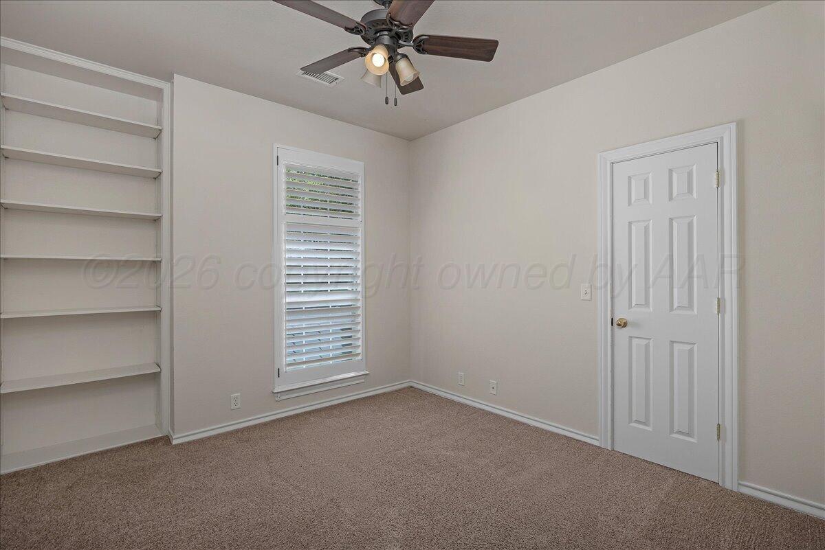 5823 Nicholas Circle Amarillo, TX 79109 - Photo 21 of 31 a view of an empty room with a window