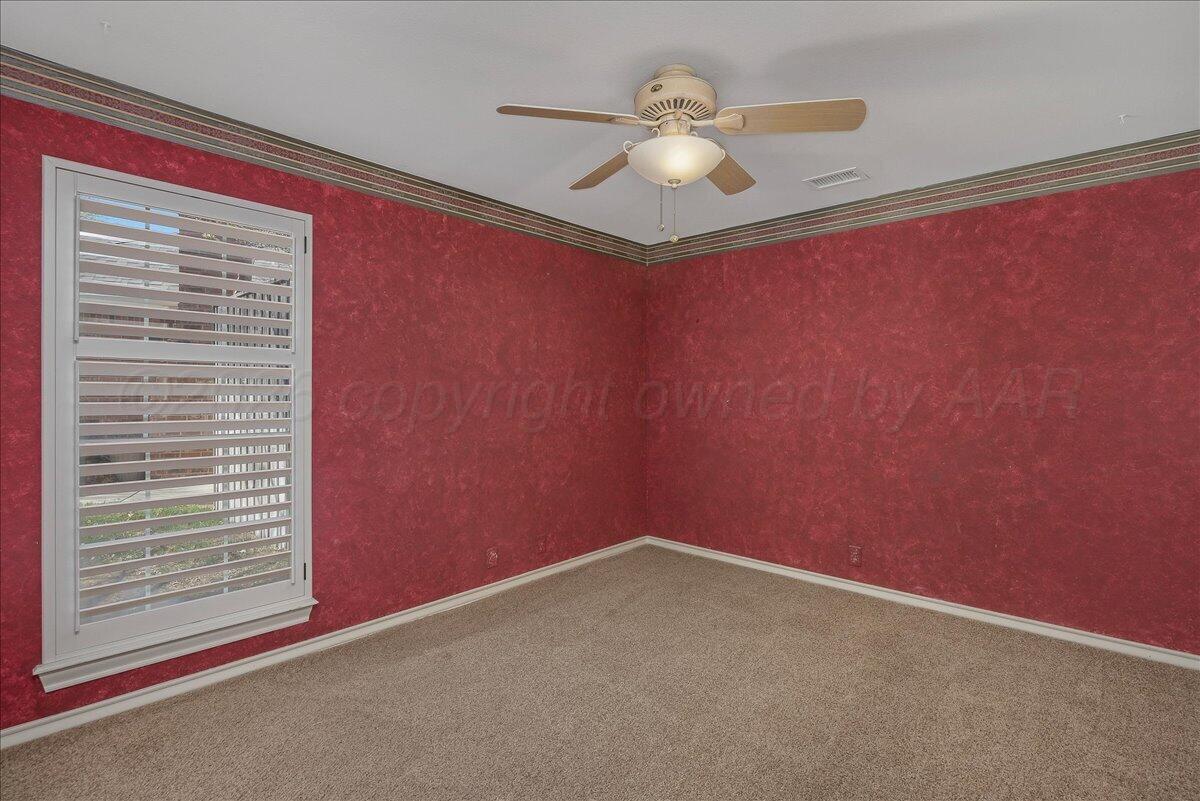5823 Nicholas Circle Amarillo, TX 79109 - Photo 24 of 31 a view of an empty room with a window