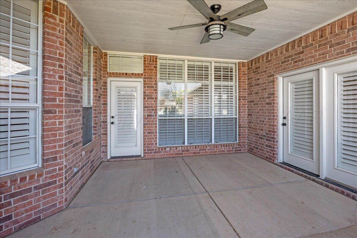 5823 Nicholas Circle Amarillo, TX 79109 - Photo 27 of 31 a view of an empty room with a windows