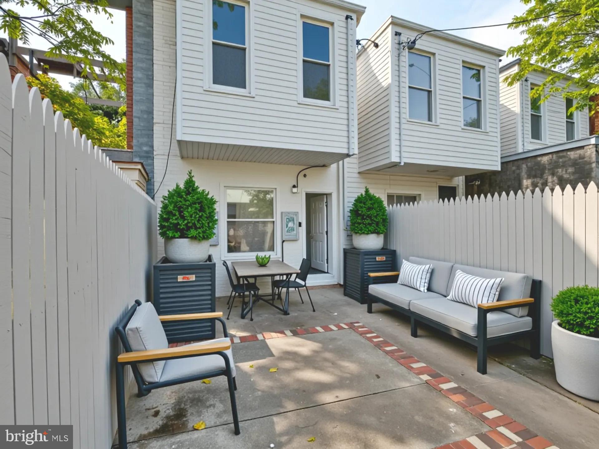 2114 Cliftwood Avenue Baltimore, MD 21213 - Photo 12 of 58 a view of a house with backyard and sitting area