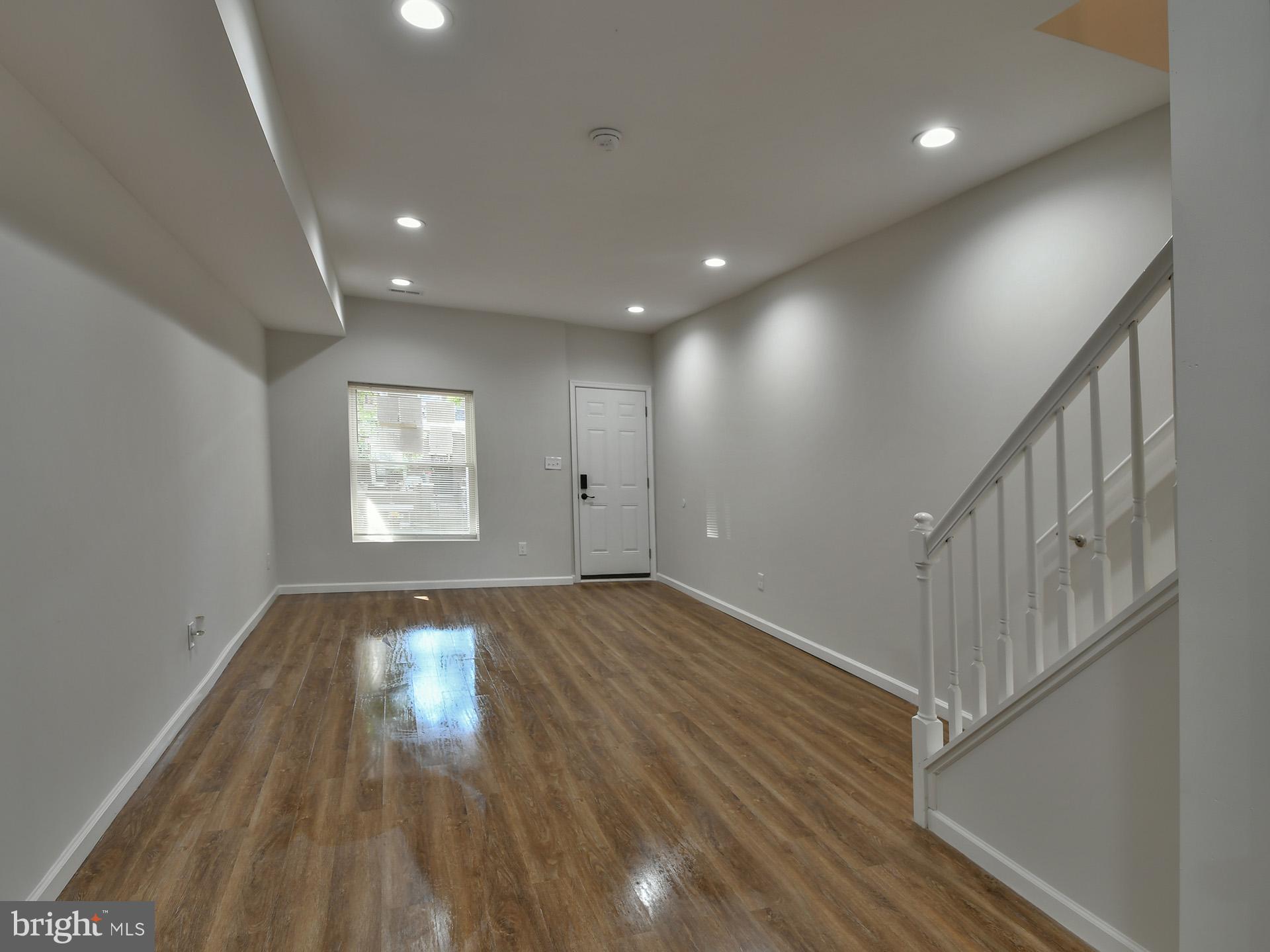 2114 Cliftwood Avenue Baltimore, MD 21213 - Photo 19 of 58 a view of entryway with wooden floor