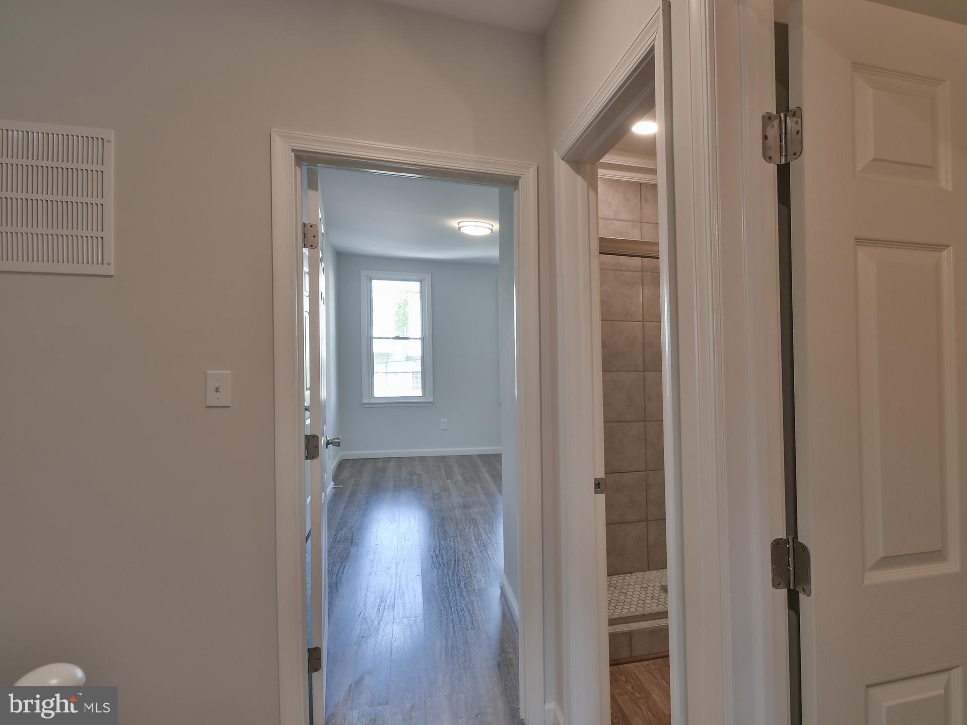 2114 Cliftwood Avenue Baltimore, MD 21213 - Photo 31 of 58 wooden floor in a gallery