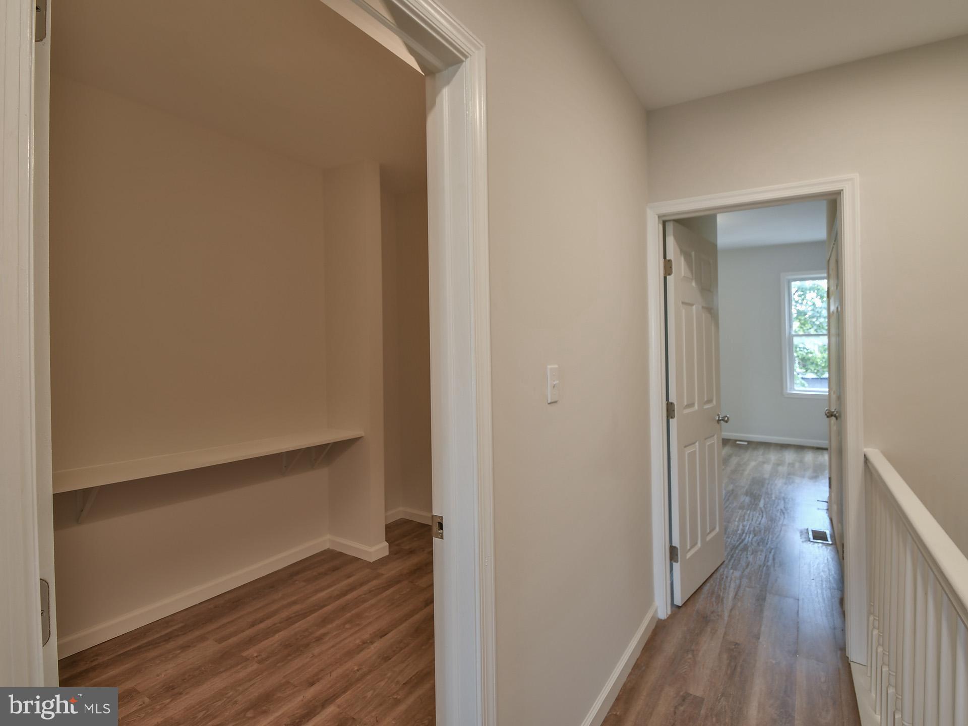 2114 Cliftwood Avenue Baltimore, MD 21213 - Photo 37 of 58 a view of a room with wooden floor