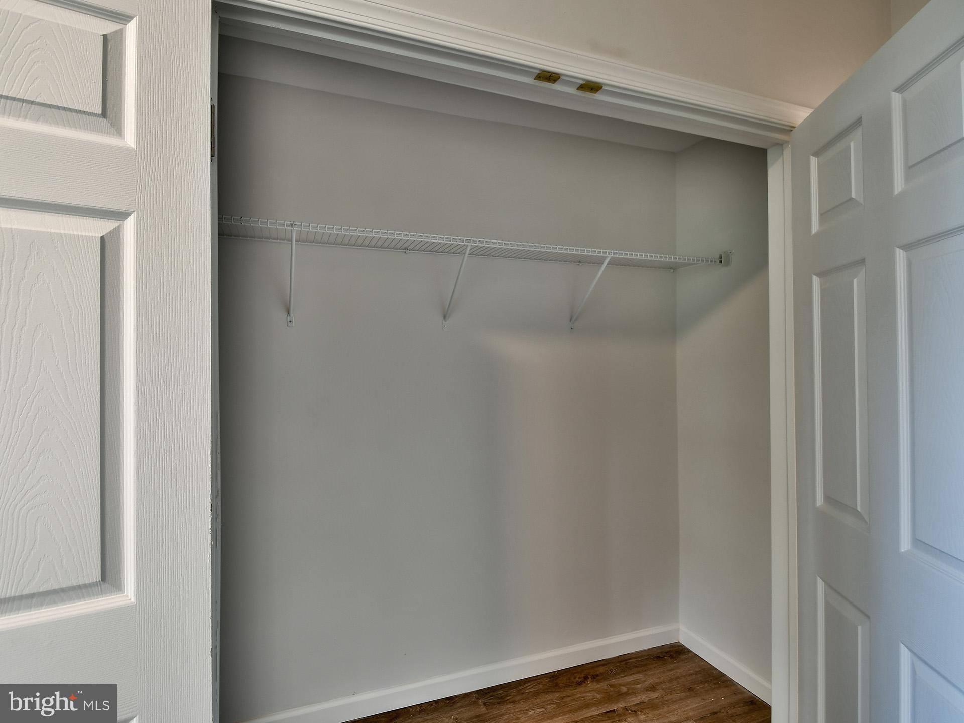 2114 Cliftwood Avenue Baltimore, MD 21213 - Photo 49 of 58 a view of a room with wooden floor