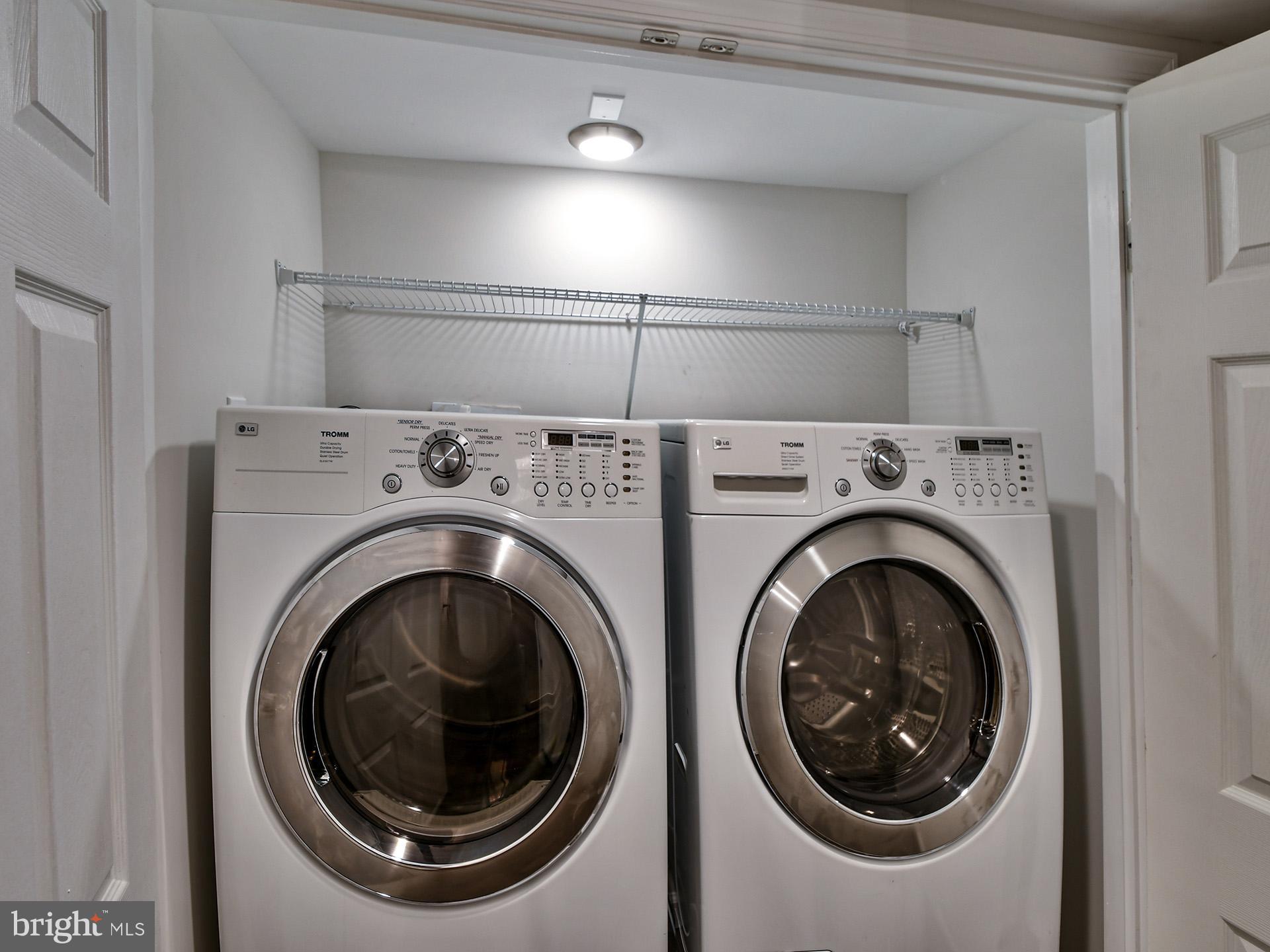 2114 Cliftwood Avenue Baltimore, MD 21213 - Photo 56 of 58 a utility room with dryer and washer