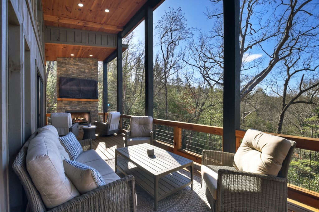 238 Hooch Holler Lane Morganton, GA 30560 - Photo 13 of 49 a outdoor living room with furniture and a potted plant