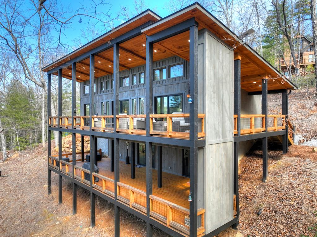 238 Hooch Holler Lane Morganton, GA 30560 - Photo 2 of 49 a view of a house with a wooden deck