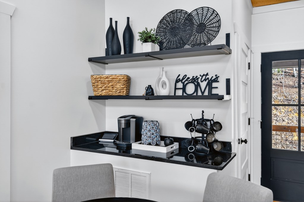 238 Hooch Holler Lane Morganton, GA 30560 - Photo 27 of 49 a kitchen with a sink and a stove with white cabinets