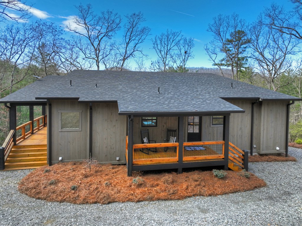238 Hooch Holler Lane Morganton, GA 30560 - Photo 3 of 49 a backyard of a house with barbeque oven
