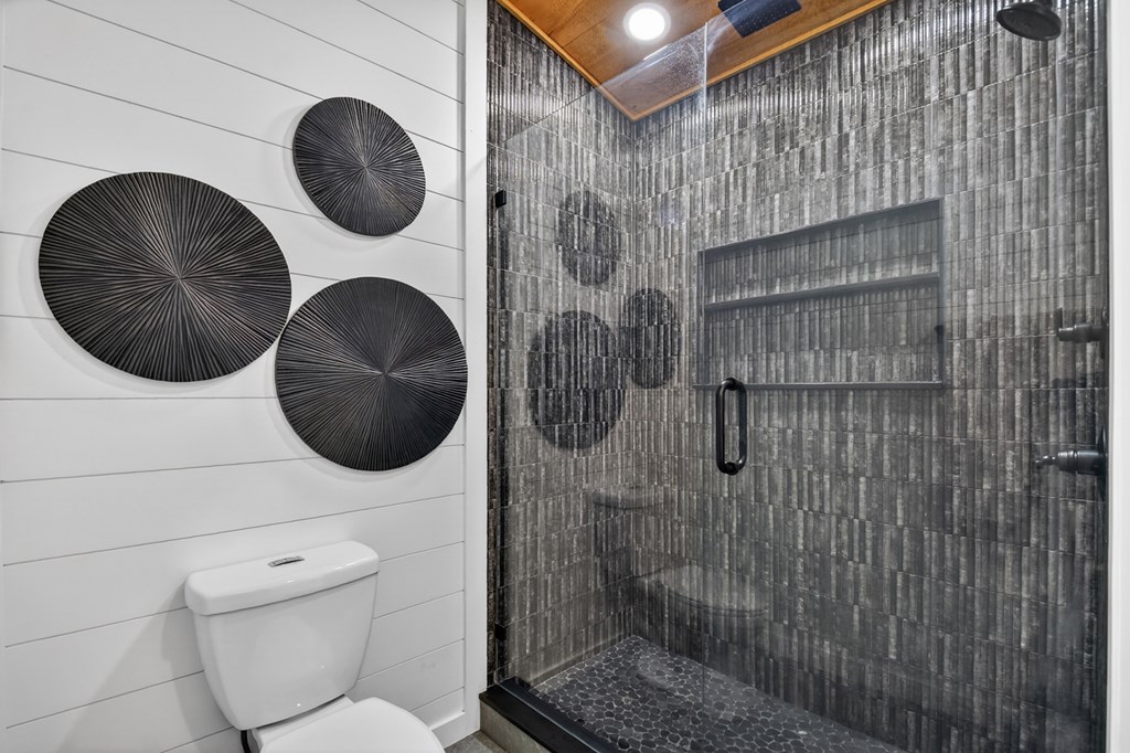 238 Hooch Holler Lane Morganton, GA 30560 - Photo 37 of 49 a bathroom with a toilet and a sink