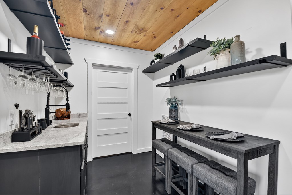238 Hooch Holler Lane Morganton, GA 30560 - Photo 41 of 49 a kitchen with table and chairs