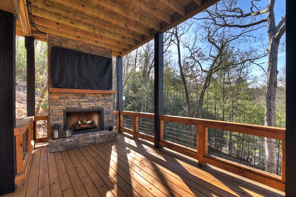 238 Hooch Holler Lane Morganton, GA 30560 - Photo 48 of 49 a view of deck with furniture and fireplace