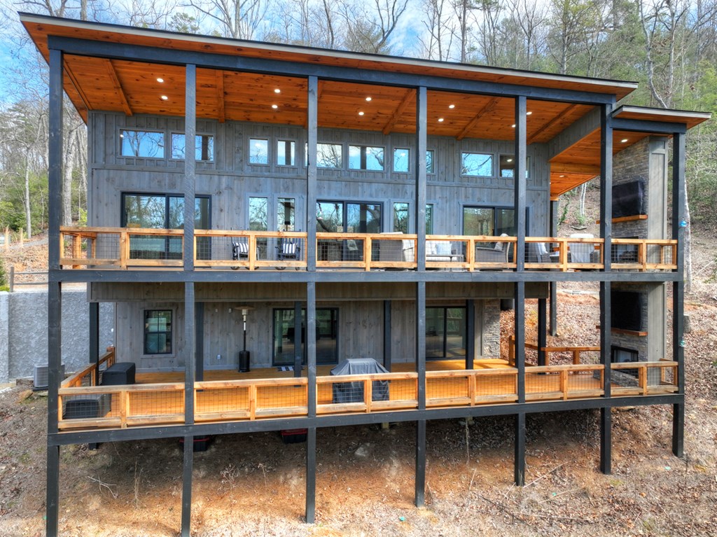 238 Hooch Holler Lane Morganton, GA 30560 - Photo 6 of 49 a view of a large building with a large window