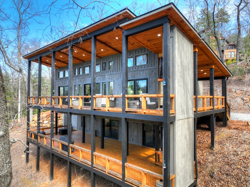 238 Hooch Holler Lane Morganton, GA 30560 - Photo 7 of 49 a view of swimming pool with outdoor seating
