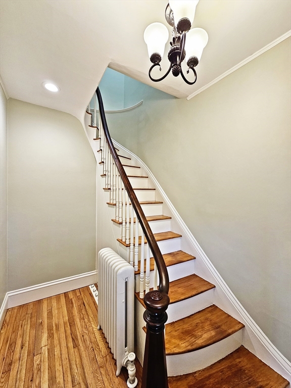 11 Channing Street, Unit 2 Newton, MA 02458 - Photo 15 of 33 a view of staircase with wooden floor