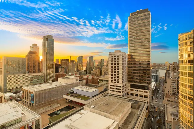 a view of a balcony with city view