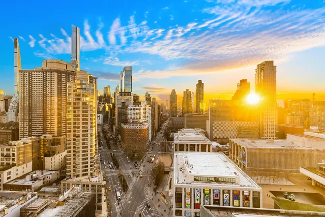 a view of a city with tall buildings