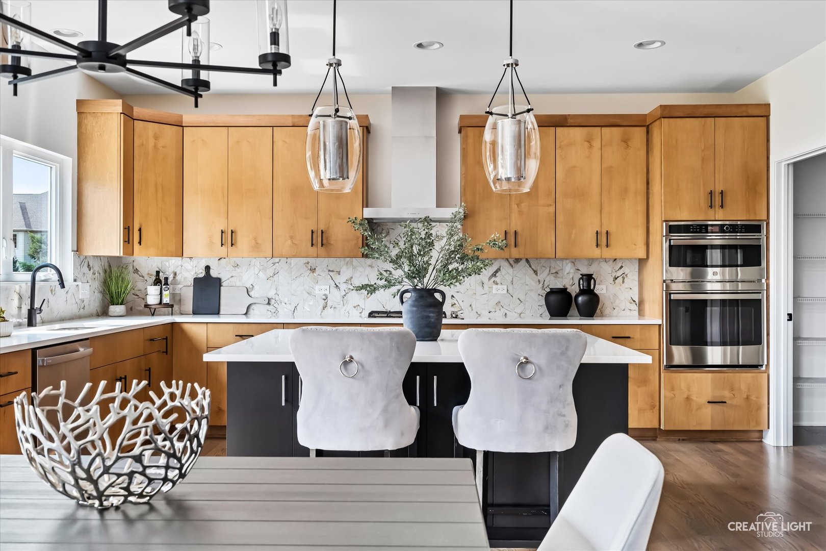 3959 Caliente Circle Naperville, IL 60564 - Photo 11 of 28 a large kitchen with a large window cabinets and stainless steel appliances