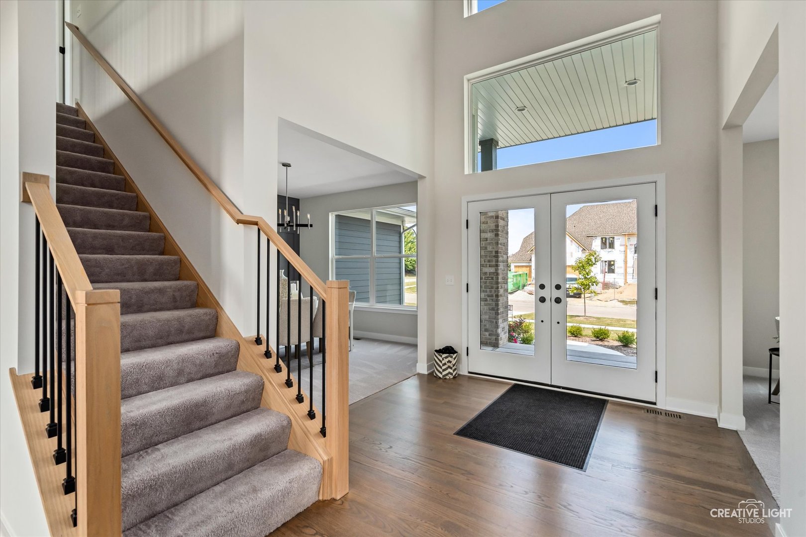 3959 Caliente Circle Naperville, IL 60564 - Photo 3 of 28 a view of an entryway with wooden floor and door