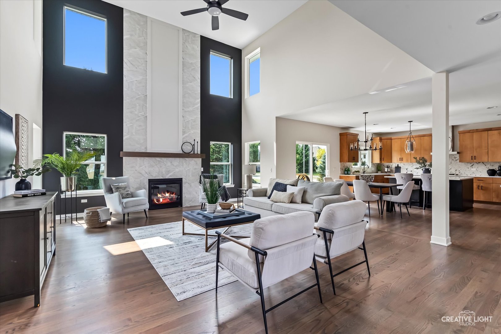 3959 Caliente Circle Naperville, IL 60564 - Photo 5 of 28 a living room with furniture fireplace and a large window