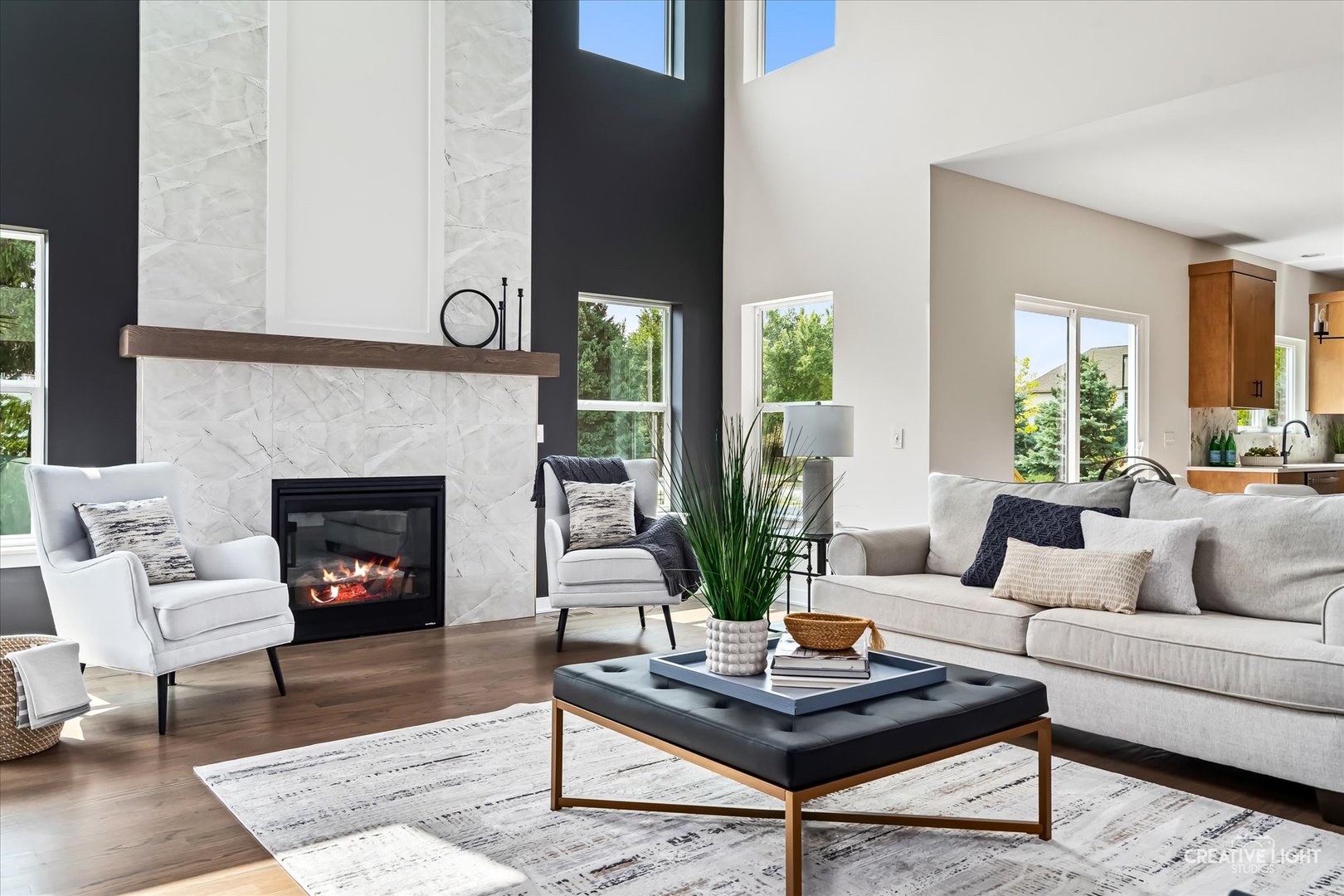 3959 Caliente Circle Naperville, IL 60564 - Photo 6 of 28 a living room with furniture a table and a fireplace