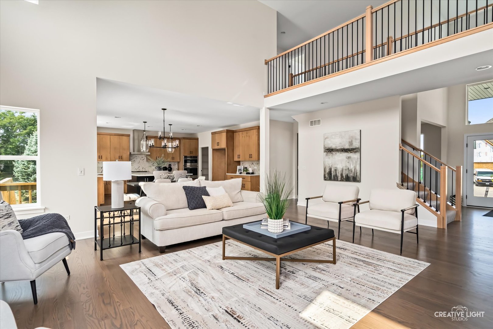 3959 Caliente Circle Naperville, IL 60564 - Photo 8 of 28 a living room with furniture a rug and a table