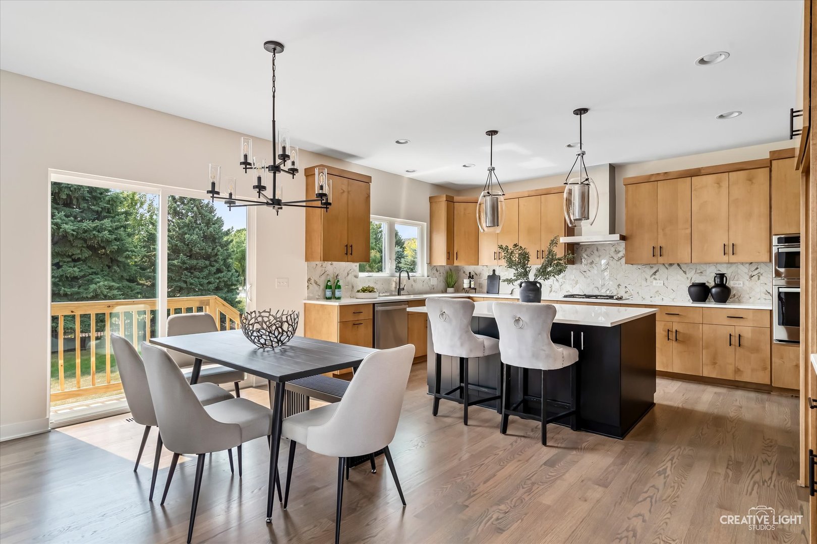 3959 Caliente Circle Naperville, IL 60564 - Photo 10 of 28 a view of kitchen with dining table chairs sink and white cabinets