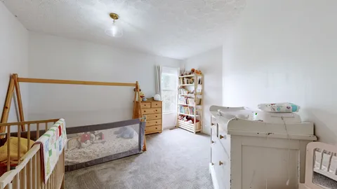 a view of livingroom with furniture and natural light