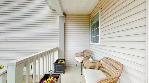 a view of balcony with patio