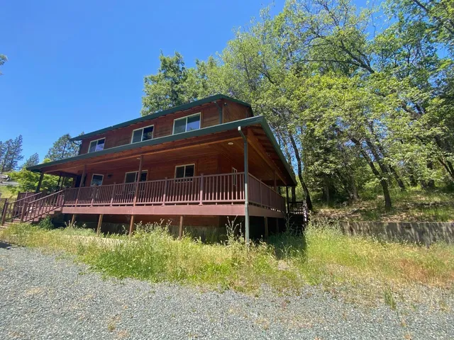 a front view of a house with a boat