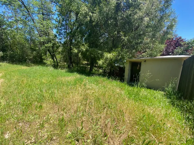 a swimming pool with wooden fence