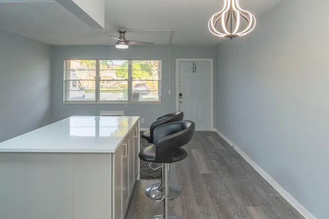 a workspace with furniture and a window