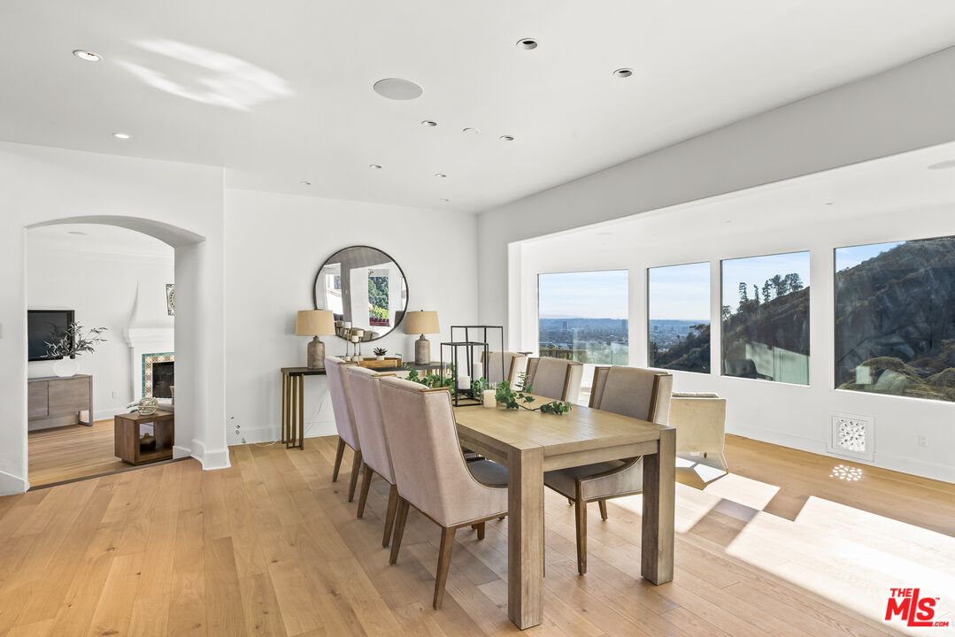 2201 Malaga Road Los Angeles, CA 90068 - Photo 14 of 51 a view of a dining room with furniture window and wooden floor