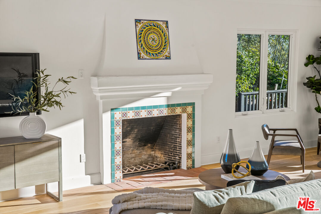 2201 Malaga Road Los Angeles, CA 90068 - Photo 17 of 51 a living room with furniture and a fireplace