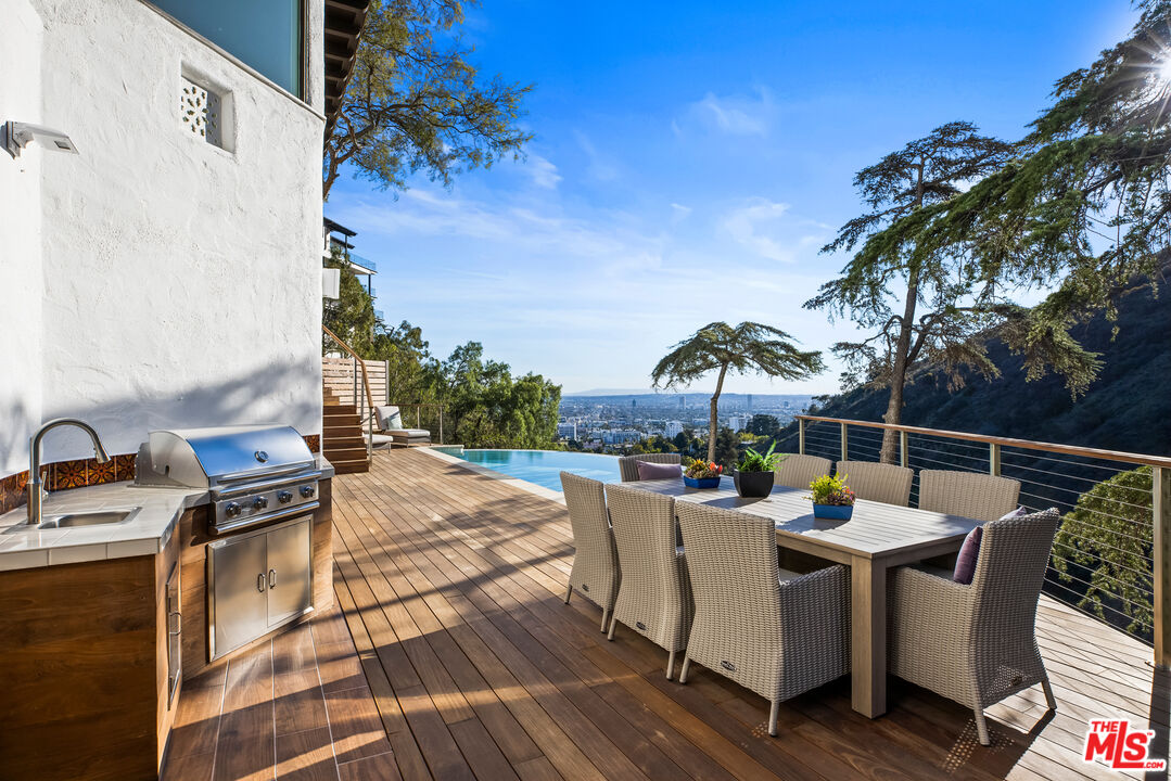2201 Malaga Road Los Angeles, CA 90068 - Photo 22 of 51 a view of a roof deck with furniture