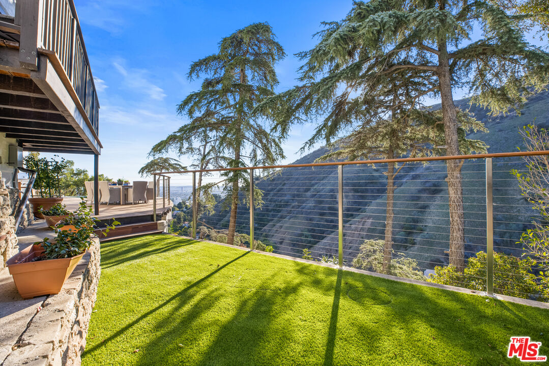 2201 Malaga Road Los Angeles, CA 90068 - Photo 25 of 51 a view of house with a backyard